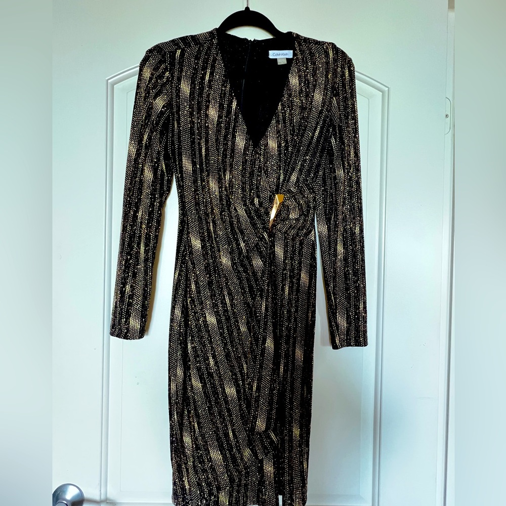 Gorgeous sparkling gold and black wrap dress